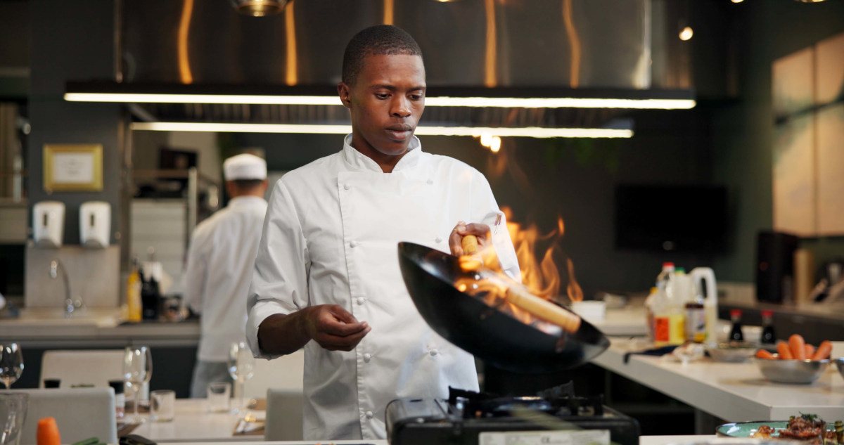 Chef_with_fire_frying_pan